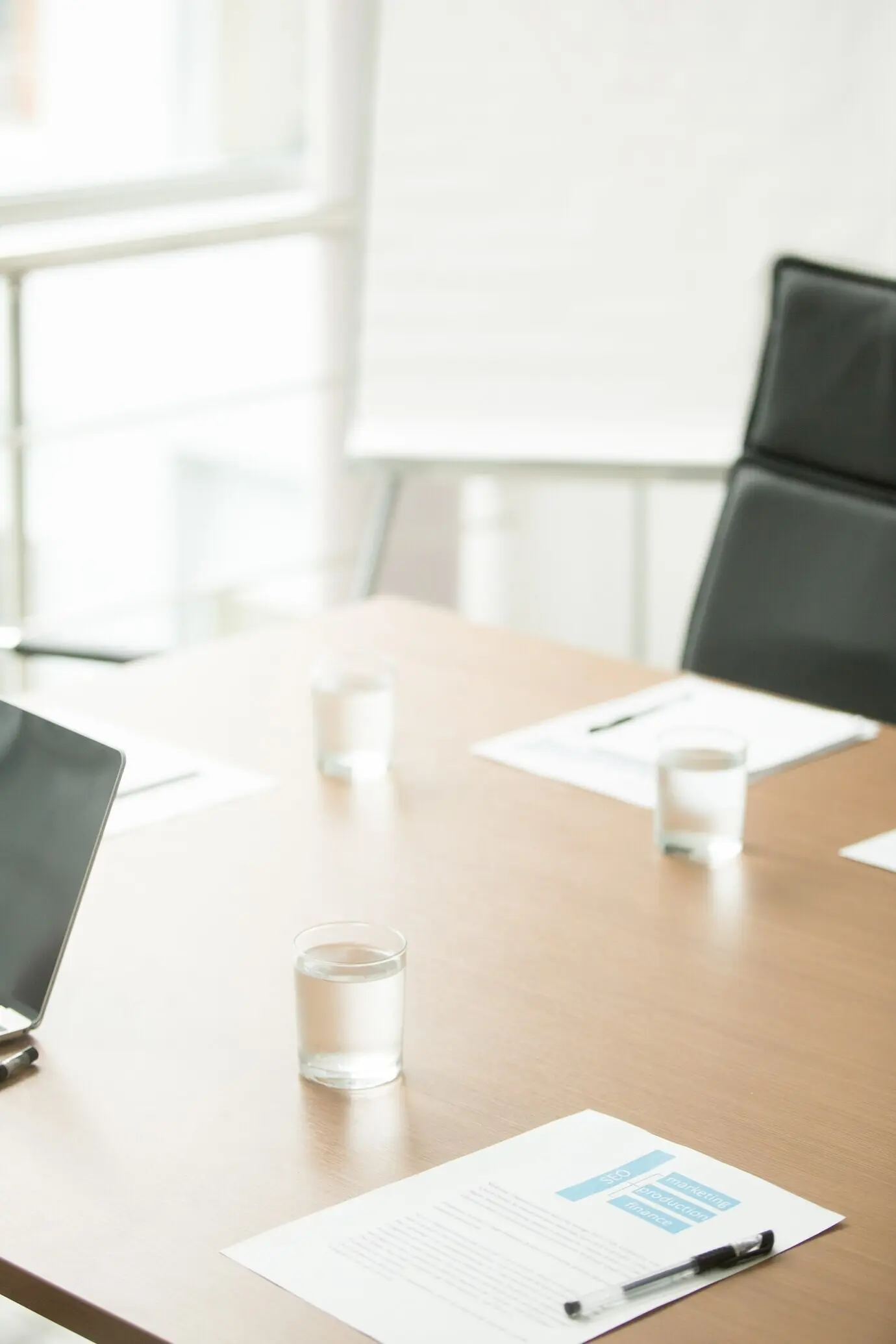 Boardroom interior featuring a conference table in a modern business center office.