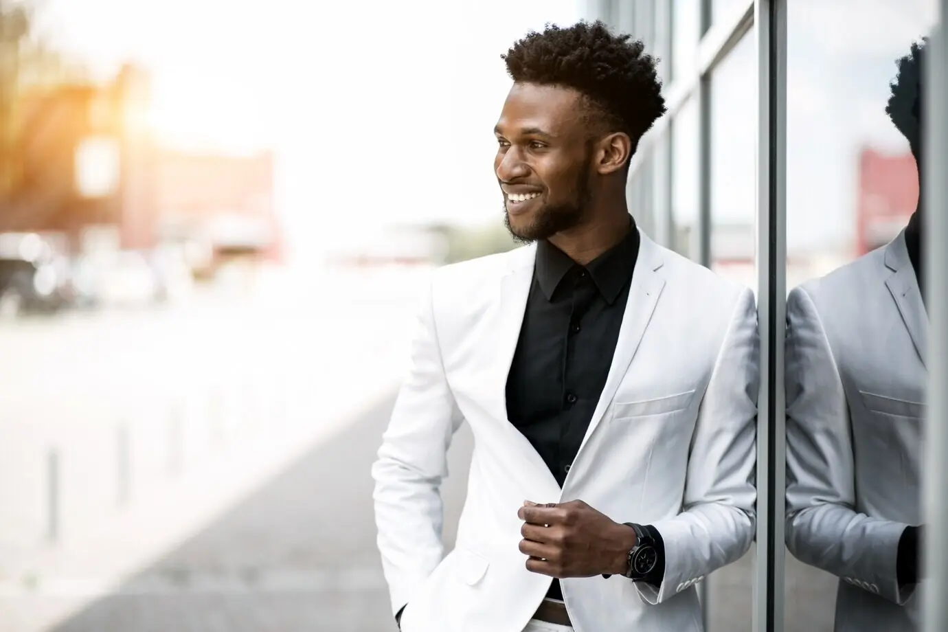 Appearance of a male businessman in a black shirt talking.